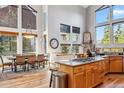 Spacious kitchen with island, stainless steel appliances, and hardwood floors at 180 Emmett Lode Rd, Breckenridge, CO 80424