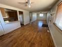 Bright living room with hardwood floors and an open concept at 1971 S Dahlia St, Denver, CO 80222