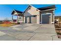 Modern two-story house with two car garage at 23835 E River Front Dr, Aurora, CO 80019