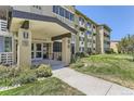 Exterior view of building with landscaping at 635 S Alton Way # 11-A, Denver, CO 80247