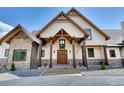 Stunning Craftsman home with stone and wood accents at 5236 Bear Mountain Dr, Evergreen, CO 80439