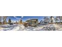 House on a snow-covered street with other houses visible at 2360 S Franklin St, Denver, CO 80210