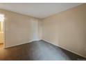 Simple carpeted bedroom with a closet at 6705 S Field St # 803, Littleton, CO 80128