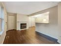 Bright living room with fireplace and hardwood floors at 6705 S Field St # 803, Littleton, CO 80128