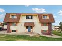 Condo building exterior view showing a well maintained property at 10211 Ura Ln # 8-207, Thornton, CO 80260