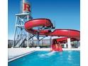 Community water park with a large pool and exciting water slide at 16081 E 111Th Dr, Commerce City, CO 80022