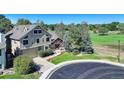 Two-story home with golf course and mountain views at 114 E 14Th Ct, Broomfield, CO 80020