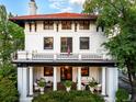 Stunning two-story home with balcony and porch at 110 N Franklin St, Denver, CO 80218