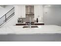 Modern kitchen with stainless steel appliances and quartz countertops at 3450 N Downing St # 3, Denver, CO 80205