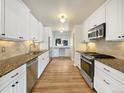 Modern kitchen with stainless steel appliances and granite countertops at 7264 Siena Way # C, Boulder, CO 80301