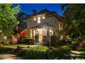 Stone house exterior at night, beautifully lit at 3359 Alcott St, Denver, CO 80211