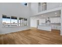 Spacious great room with high ceilings and kitchen views at 3452 N Gold Bug Ct, Aurora, CO 80019