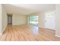 Bright living room featuring hardwood floors and large windows at 2866 E Euclid Pl, Centennial, CO 80121