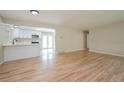 Spacious living room with hardwood floors and open kitchen view at 2866 E Euclid Pl, Centennial, CO 80121