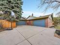 Two-car attached garage with additional detached garage at 6765 S Adams Way, Centennial, CO 80122