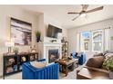 Bright living room with fireplace and comfortable seating at 1481 Harebell St, Berthoud, CO 80513