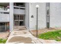 Condo building entrance with stairs and walkway at 13962 E Stanford Cir # L08, Aurora, CO 80015