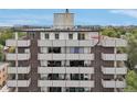 Exterior view of a multi-story building with multiple balconies at 1313 Steele St # 801, Denver, CO 80206