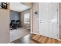 Bright home office with window, desk, and two monitors at 944 Mcmurdo Cir, Castle Rock, CO 80108