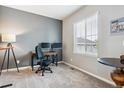 Home office features a desk, chair, and ample natural light at 944 Mcmurdo Cir, Castle Rock, CO 80108