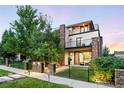 Modern two-story home with stone accents and landscaping at 3950 Osage St, Denver, CO 80211