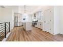 Spacious kitchen with island, stainless steel appliances, and light gray cabinets at 5870 W 91St Ave, Westminster, CO 80031