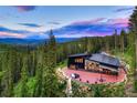 Modern mountain home with patio and mountain views at 133 Adams Way, Breckenridge, CO 80424