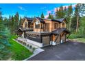 Luxury home with a three-car garage and expansive landscaping at 72 Dyer Trl, Breckenridge, CO 80424