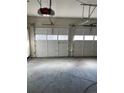 Two-car garage with an automatic garage door opener at 3306 S Uinta Ct, Denver, CO 80231