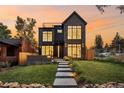 Stunning two-story brick house exterior at sunset at 3362 W 32Nd Ave, Denver, CO 80211