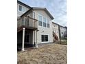 Two-story house with deck and fenced backyard at 4773 S Wenatchee Cir, Aurora, CO 80015