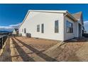 Rear exterior of the home, showcasing a fence at 11442 Autumn Moon St, Littleton, CO 80125