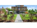 Modern home with wood and concrete accents at 580 S Franklin St, Denver, CO 80209