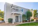 Townhouse exterior with balcony and landscaping at 7915 Chase Cir # 156, Arvada, CO 80003