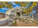 Beautiful ranch home with fall foliage at 23375 E Moraine Pl, Aurora, CO 80016