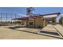 Baseball field concession stand with shaded seating area at 2070 S Haleyville Way, Aurora, CO 80018