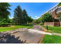 Well-maintained pathway meandering through the community's landscape at 7000 E Quincy Ave # 204, Denver, CO 80237
