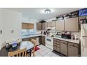 Galley kitchen with granite countertops and appliances at 2241 Dexter Dr # 3, Longmont, CO 80501