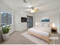 Bright bedroom with balcony access and ceiling fan at 5550 W 80Th Pl # 20, Arvada, CO 80003