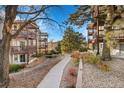 Landscaped walkway between condo buildings at 17662 E Loyola Dr # 2132L, Aurora, CO 80013