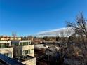 View of neighborhood from property, showing surrounding buildings at 2140 S Ash St # 104, Denver, CO 80222