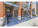 Brick building with covered parking and accessible entrance at 2955 Inca St # 2N, Denver, CO 80202