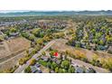 Aerial view of a house and surrounding neighborhood at 6430 S Kendall St, Littleton, CO 80123