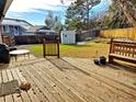 Spacious deck overlooks a fenced backyard with shed at 18929 Kent, Aurora, CO 80013