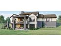 Home's back elevation showcasing a deck, patio, and stairs leading down to the yard at 6178 Oxford Peak Ln, Castle Rock, CO 80108
