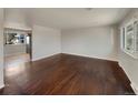 Spacious living room with hardwood floors at 8311 Ogden St, Denver, CO 80229