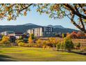 Apartment building nestled in scenic landscape with mountain views at 12983 W Ida Ave # 219, Littleton, CO 80127