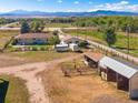Aerial view of property with outbuildings at 1637 S Us Highway 287, Berthoud, CO 80513