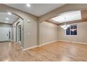 Spacious dining area with hardwood floors and natural light at 17123 E 102Nd Ave, Commerce City, CO 80022