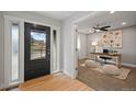 Bright entryway with hardwood floors and home office at 6690 S Sheridan Blvd, Littleton, CO 80123